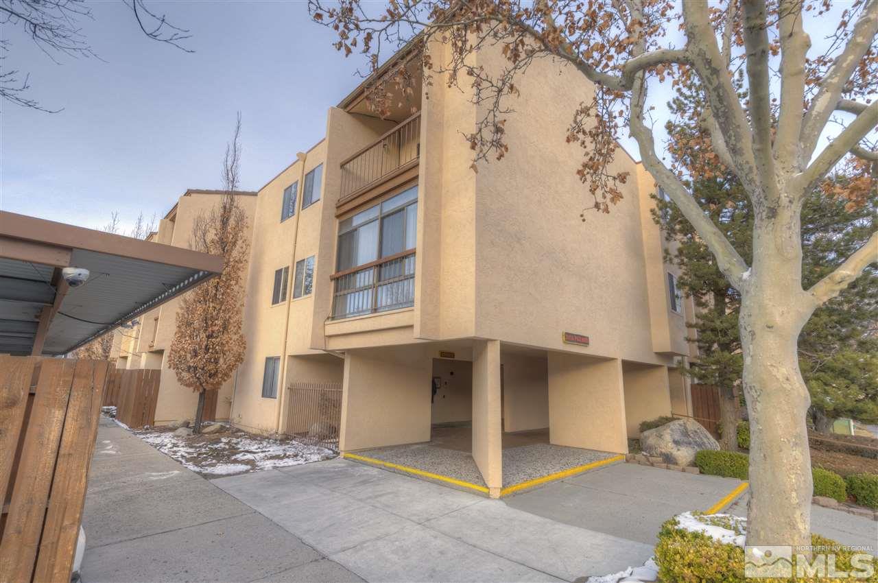 2700 Plumas Street, Unit 322 Reno, NV 89509 - Photo 3 of 18 a view of a house with a tree