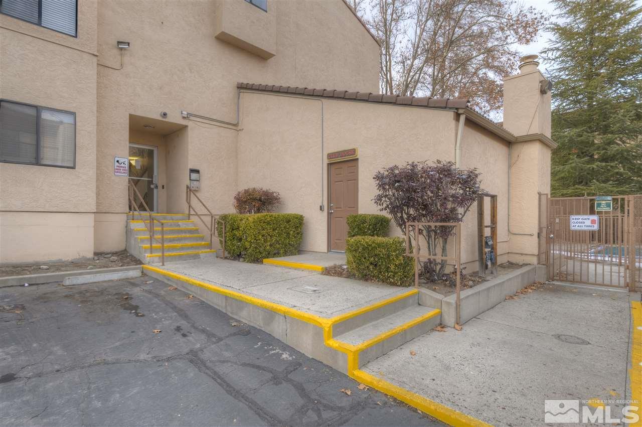 2700 Plumas Street, Unit 322 Reno, NV 89509 - Photo 6 of 18 a view of a house with backyard and wooden fence