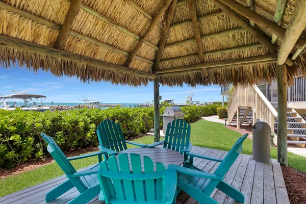 a dining room with furniture window and outside view