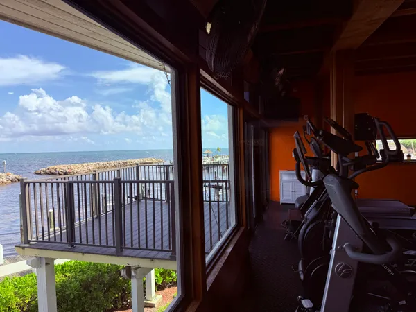 a view of a backyard with a sitting area and slide