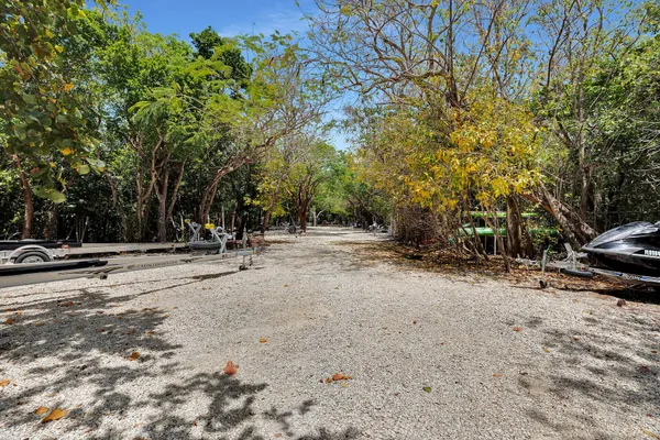 an aerial view of a house with a ocean view
