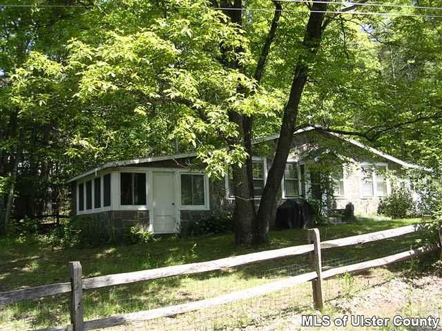 20 Sherman Road Woodstock, NY 12498 - Photo 11 of 17 front view of a house with a yard