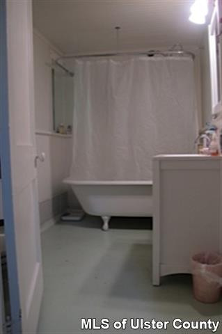 20 Sherman Road Woodstock, NY 12498 - Photo 15 of 17 a bathroom with a bathtub and a sink
