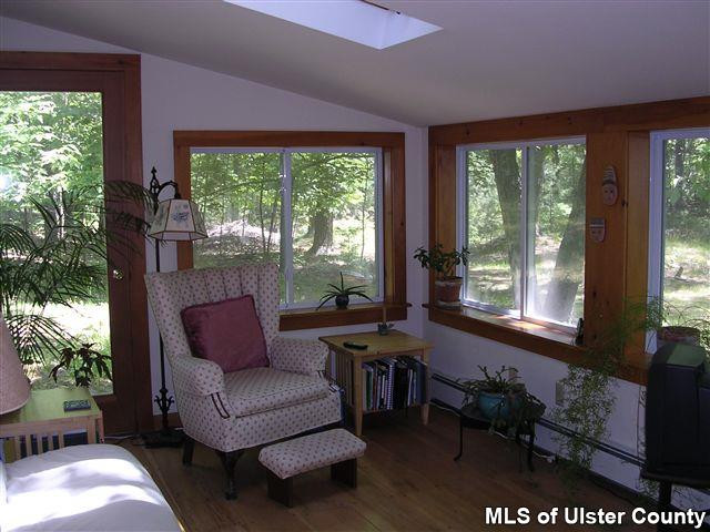 20 Sherman Road Woodstock, NY 12498 - Photo 7 of 17 a outdoor living space with furniture and a window