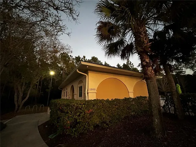a view of outdoor kitchen and patio