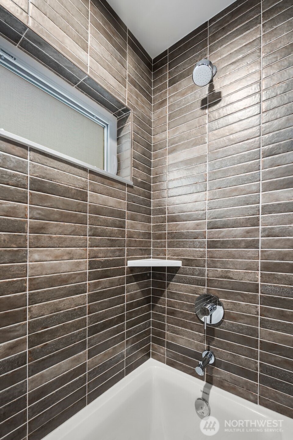 4123 B Chilberg Avenue Southwest Seattle, WA 98116 - Photo 21 of 25 a bathroom with a sink and a shower