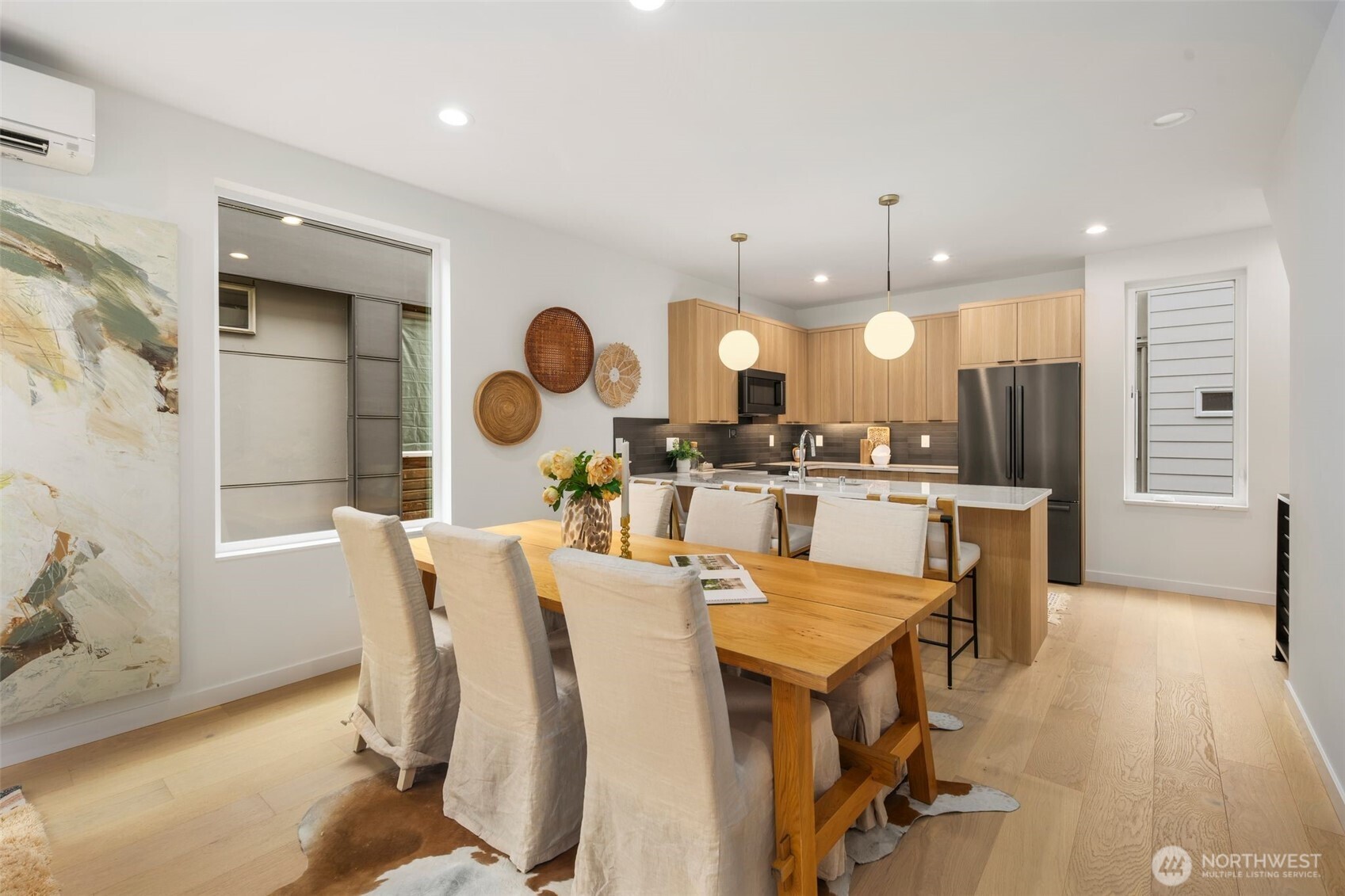 4123 B Chilberg Avenue Southwest Seattle, WA 98116 - Photo 9 of 25 a large kitchen with a table and chairs