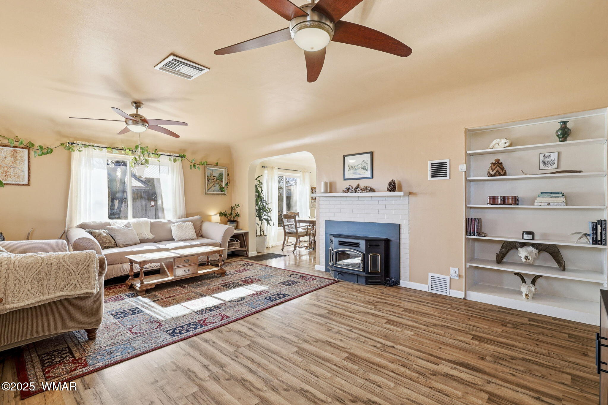 49 North Zuni Street Springerville, AZ 85938 - Photo 9 of 42 Living room with fireplace