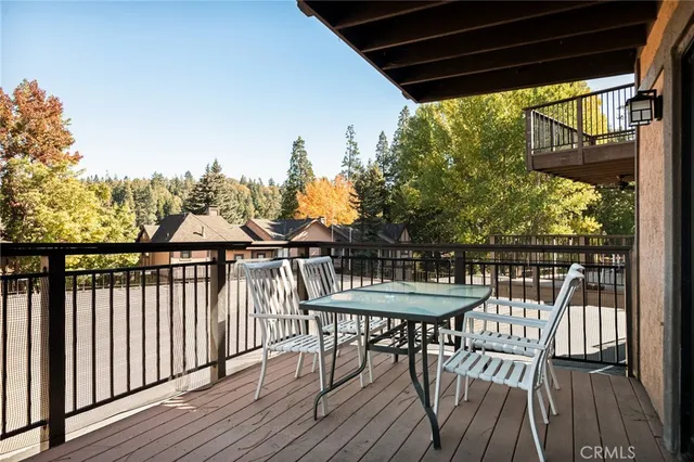 a view of a chairs and table on the wooden floor