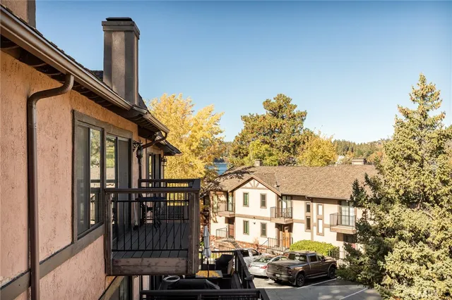 a front view of a house with outdoor seating