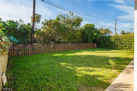 a view of a swimming pool with a garden