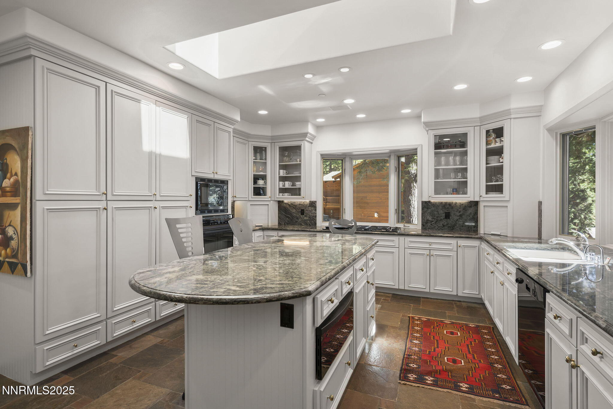 563 Tyner Way Incline Village, NV 89451 - Photo 15 of 42 a kitchen with a sink stove and refrigerator