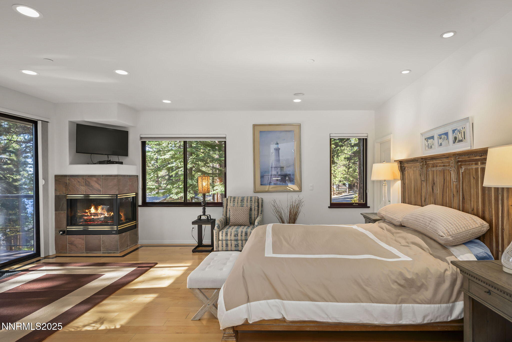 563 Tyner Way Incline Village, NV 89451 - Photo 17 of 42 a bedroom with a bed and a flat screen tv