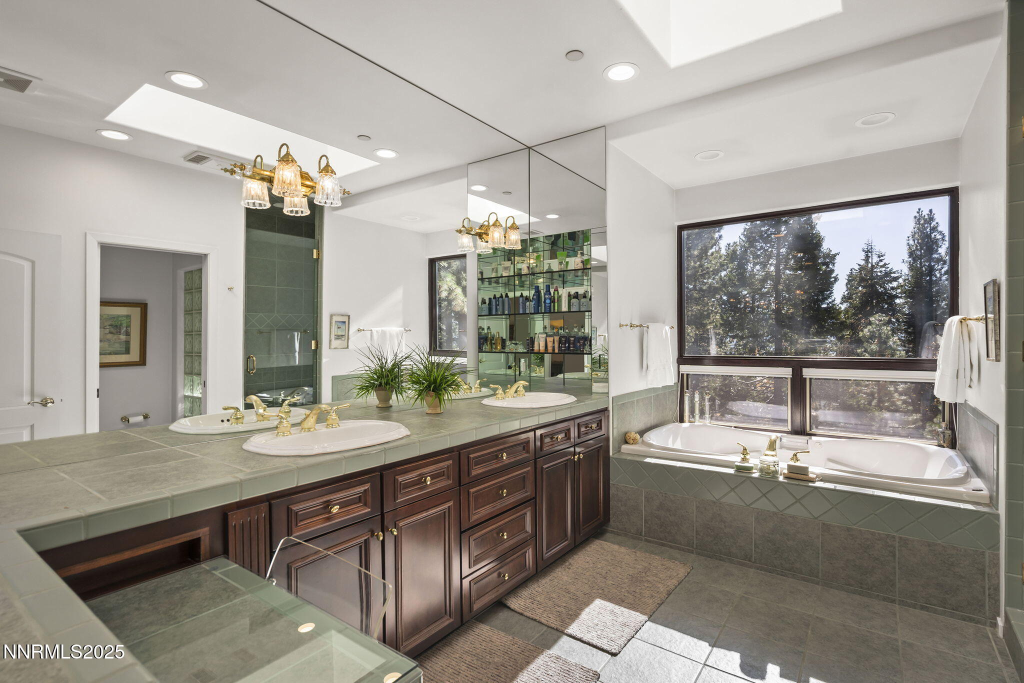 563 Tyner Way Incline Village, NV 89451 - Photo 19 of 42 a large bathroom with a large tub and sink