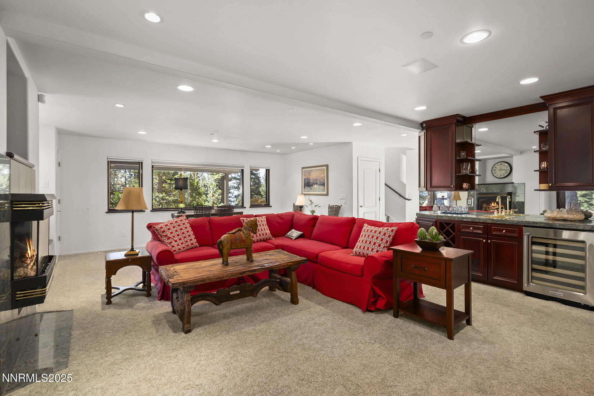 563 Tyner Way Incline Village, NV 89451 - Photo 24 of 42 a living room with furniture and a flat screen tv