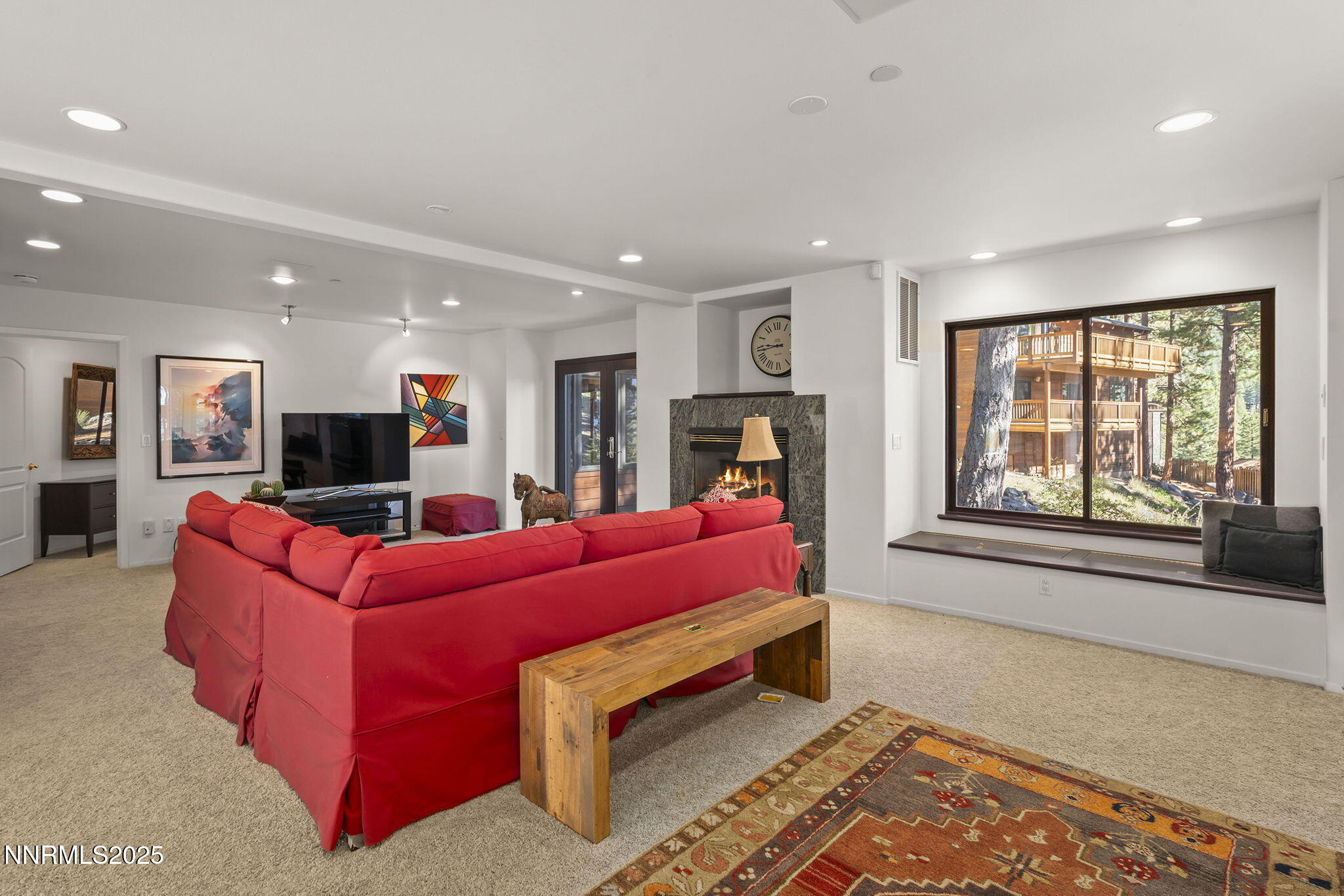 563 Tyner Way Incline Village, NV 89451 - Photo 26 of 42 a living room with furniture and a flat screen tv