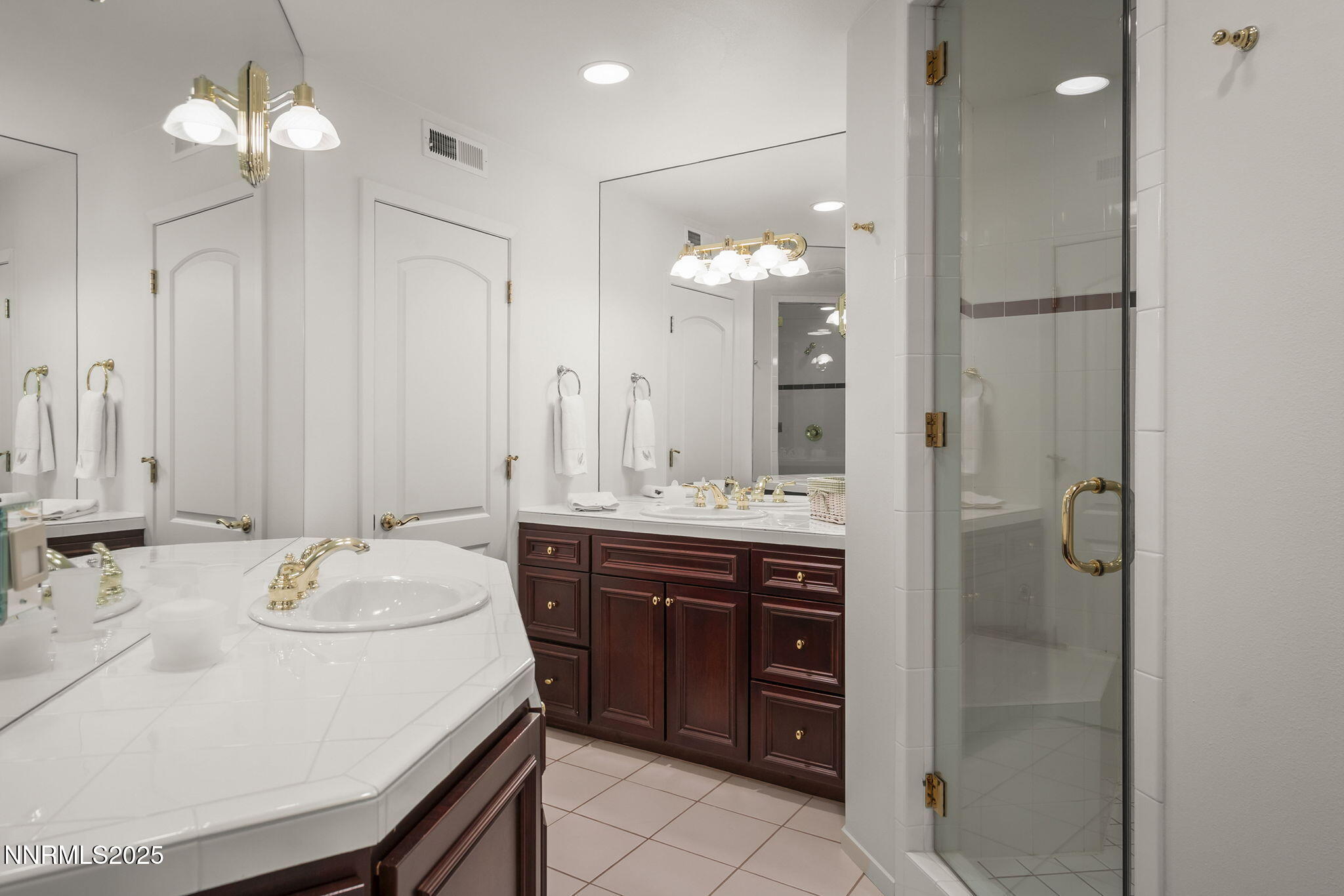 563 Tyner Way Incline Village, NV 89451 - Photo 29 of 42 a bathroom with a sink vanity and a mirror