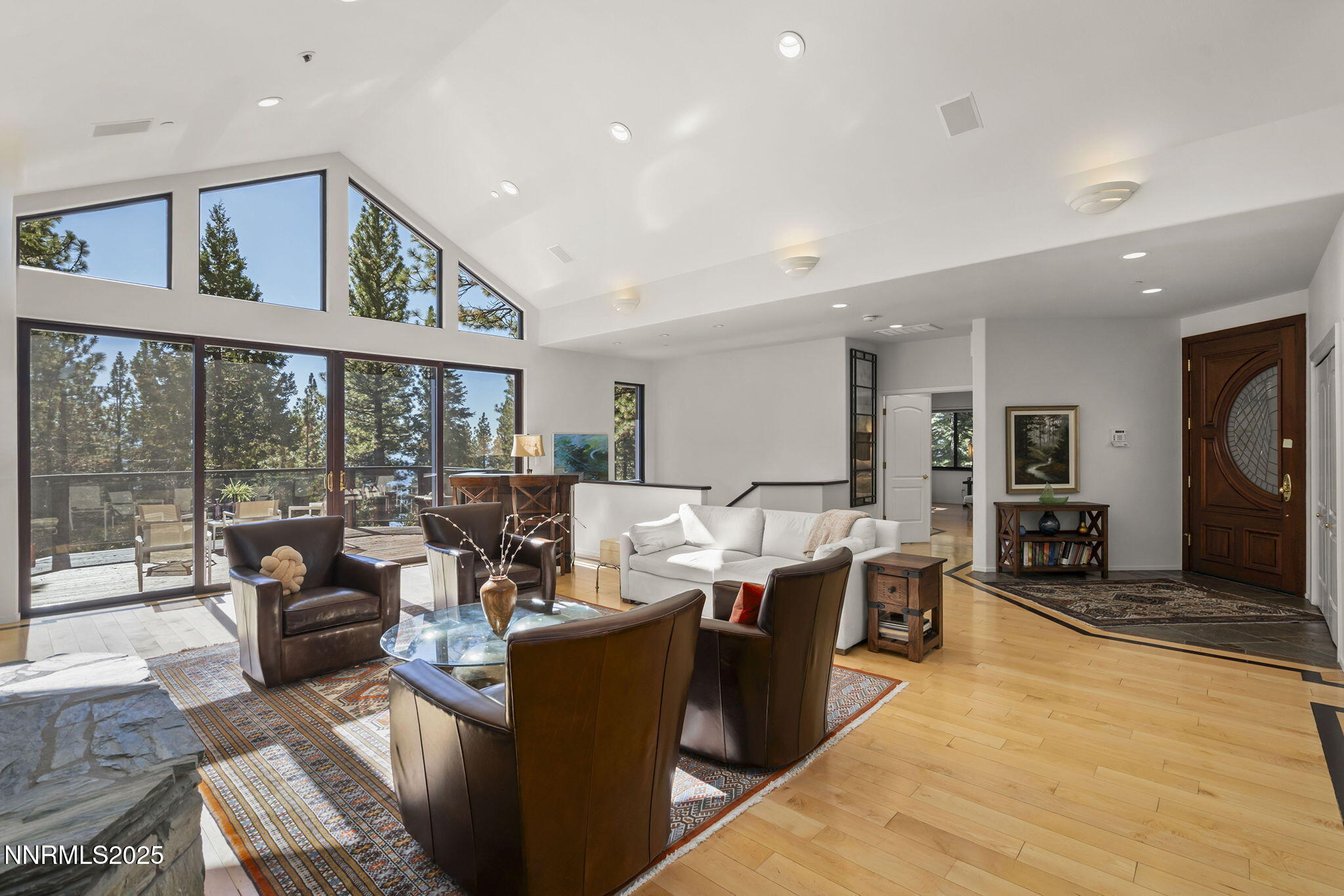 563 Tyner Way Incline Village, NV 89451 - Photo 7 of 42 a living room with fireplace furniture and a large window
