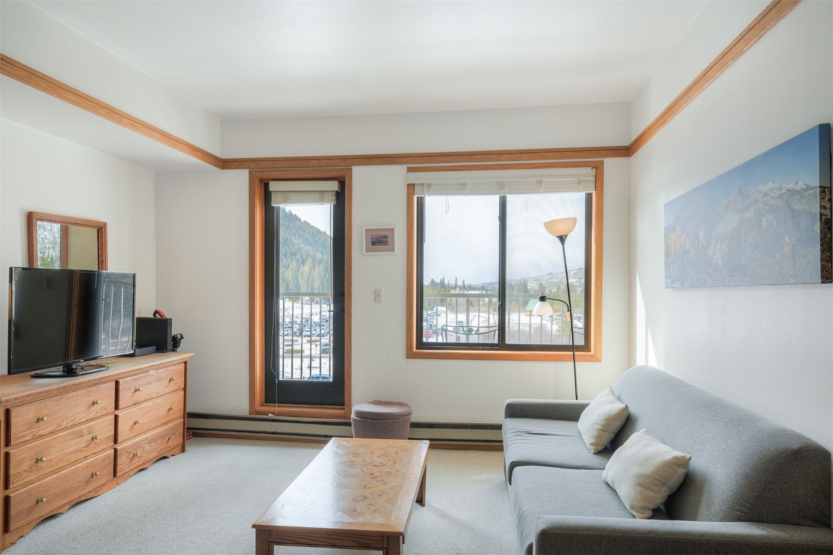 1211 West Keystone Road, Unit 2766 Keystone, CO 80435 - Photo 12 of 26 a living room with furniture and a flat screen tv