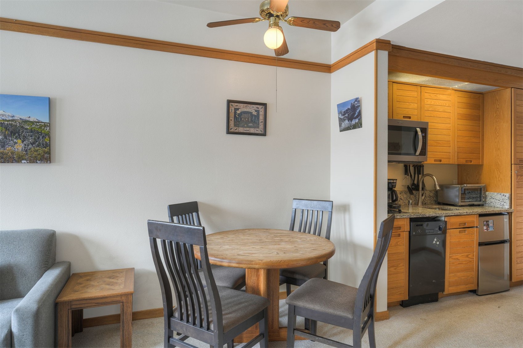 1211 West Keystone Road, Unit 2766 Keystone, CO 80435 - Photo 4 of 26 a view of a dining room with furniture window and wooden floor