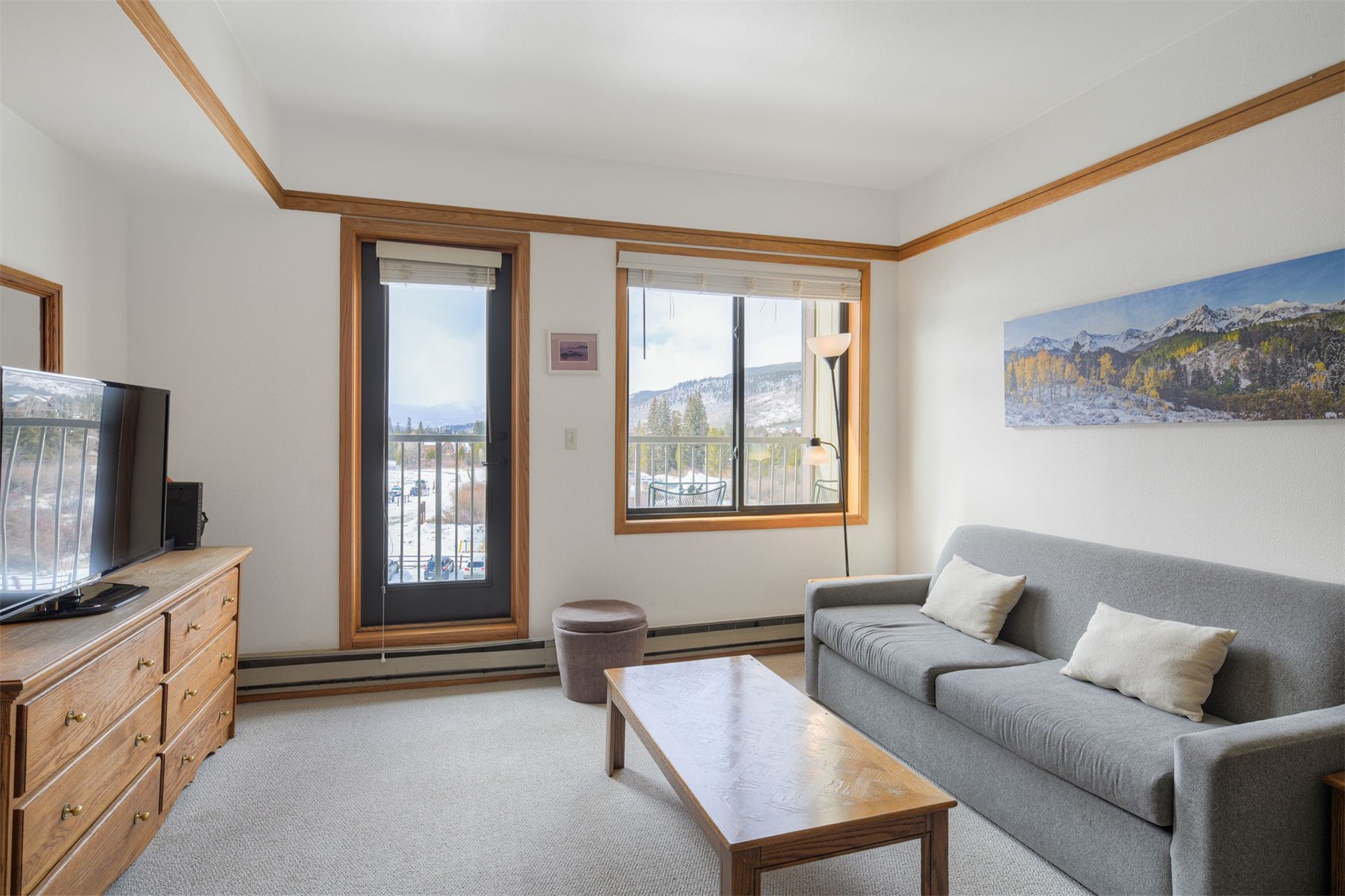 1211 West Keystone Road, Unit 2766 Keystone, CO 80435 - Photo 5 of 26 a living room with furniture and a flat screen tv