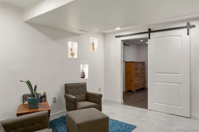 a bedroom with a bed and a closet