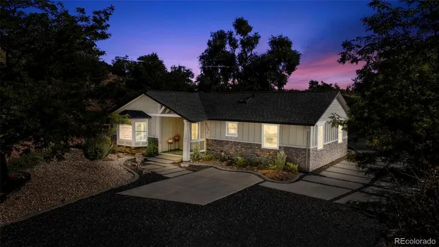 an aerial view of residential house and sandy dunes