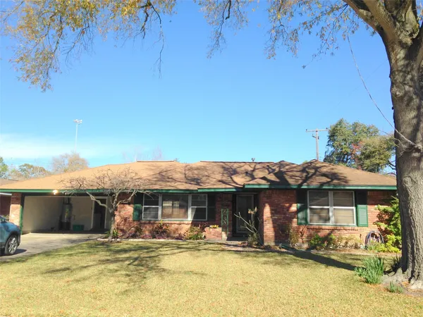 a front view of a house with swimming pool