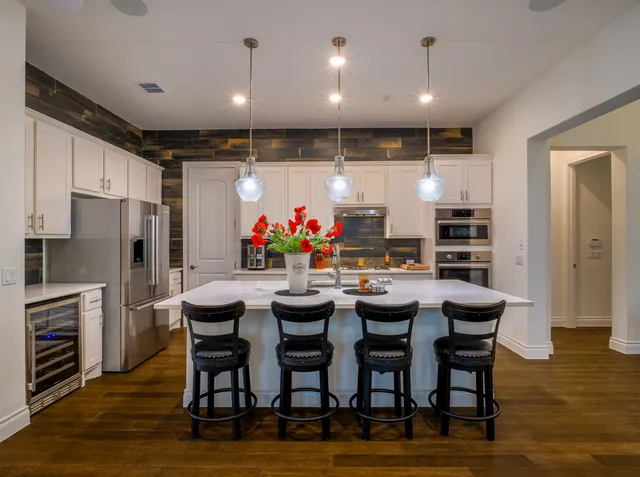 a view of a dining room with furniture