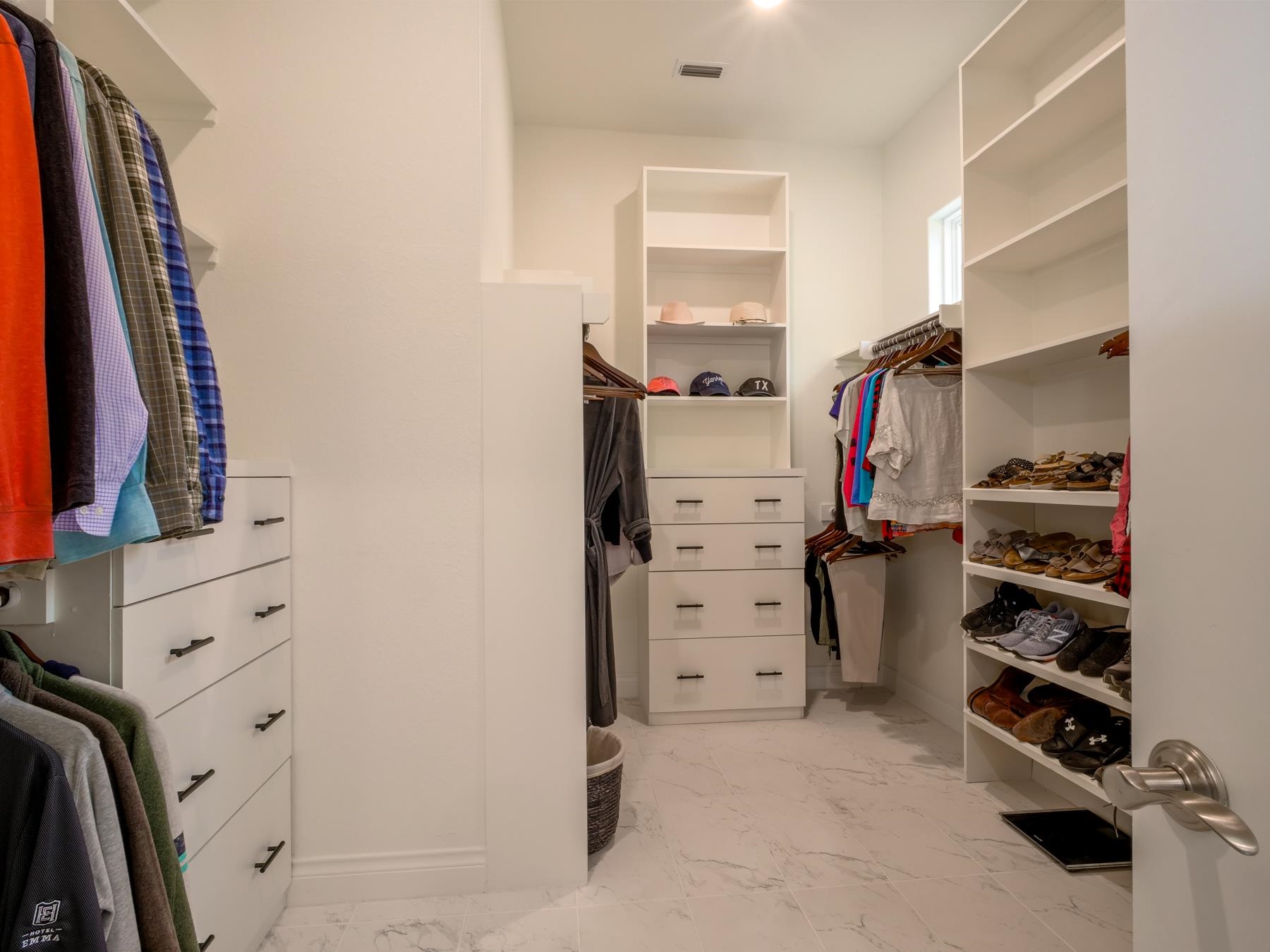115 Rivalto Drive Horseshoe Bay, TX 78657 - Photo 13 of 29 walk in closet with clothes and shoes