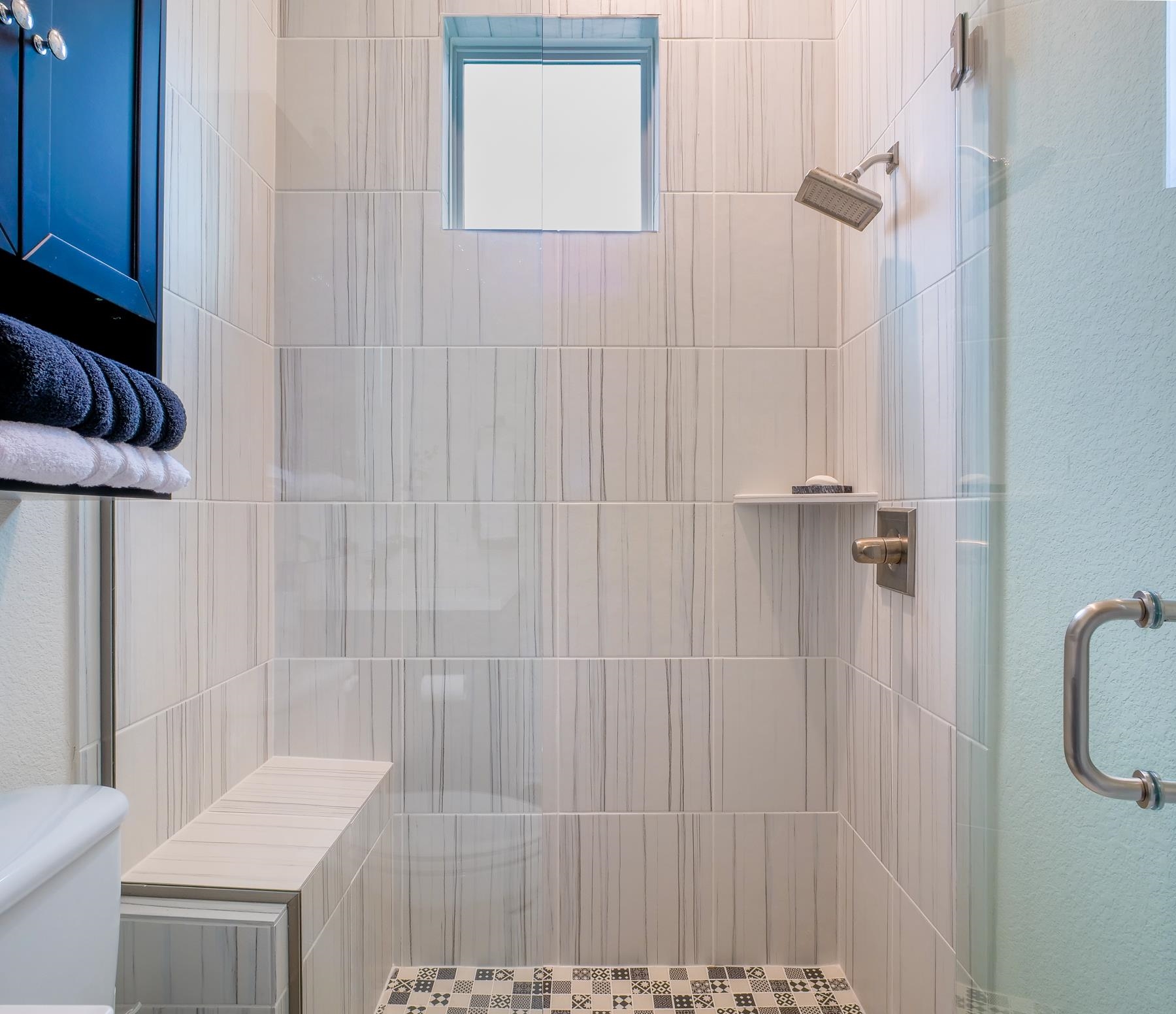 115 Rivalto Drive Horseshoe Bay, TX 78657 - Photo 15 of 29 a bathroom with a shower curtain and a sink