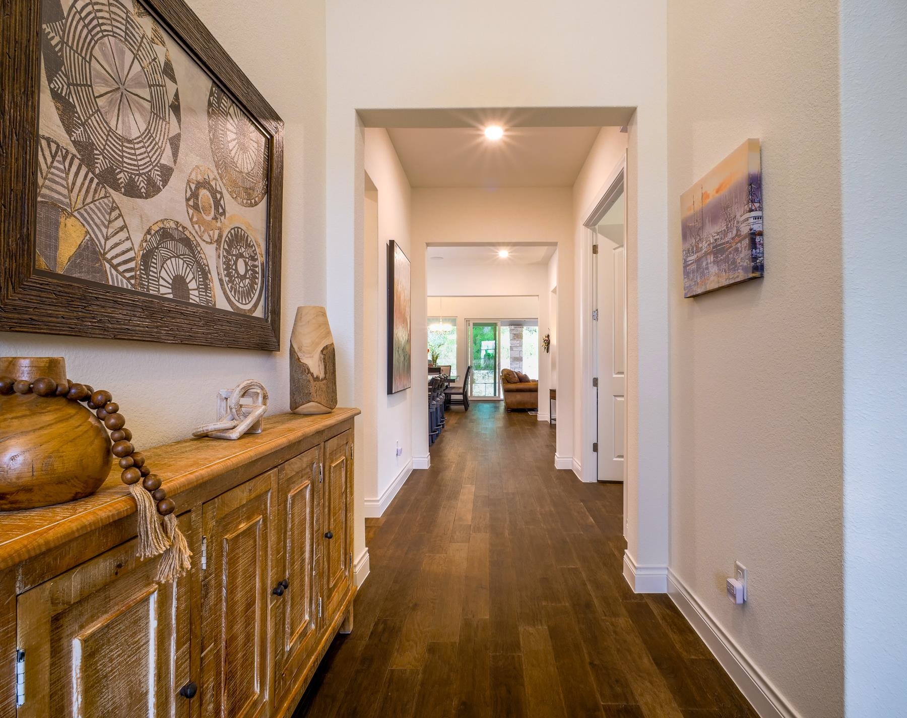 115 Rivalto Drive Horseshoe Bay, TX 78657 - Photo 17 of 29 a view of hallway with wooden floor