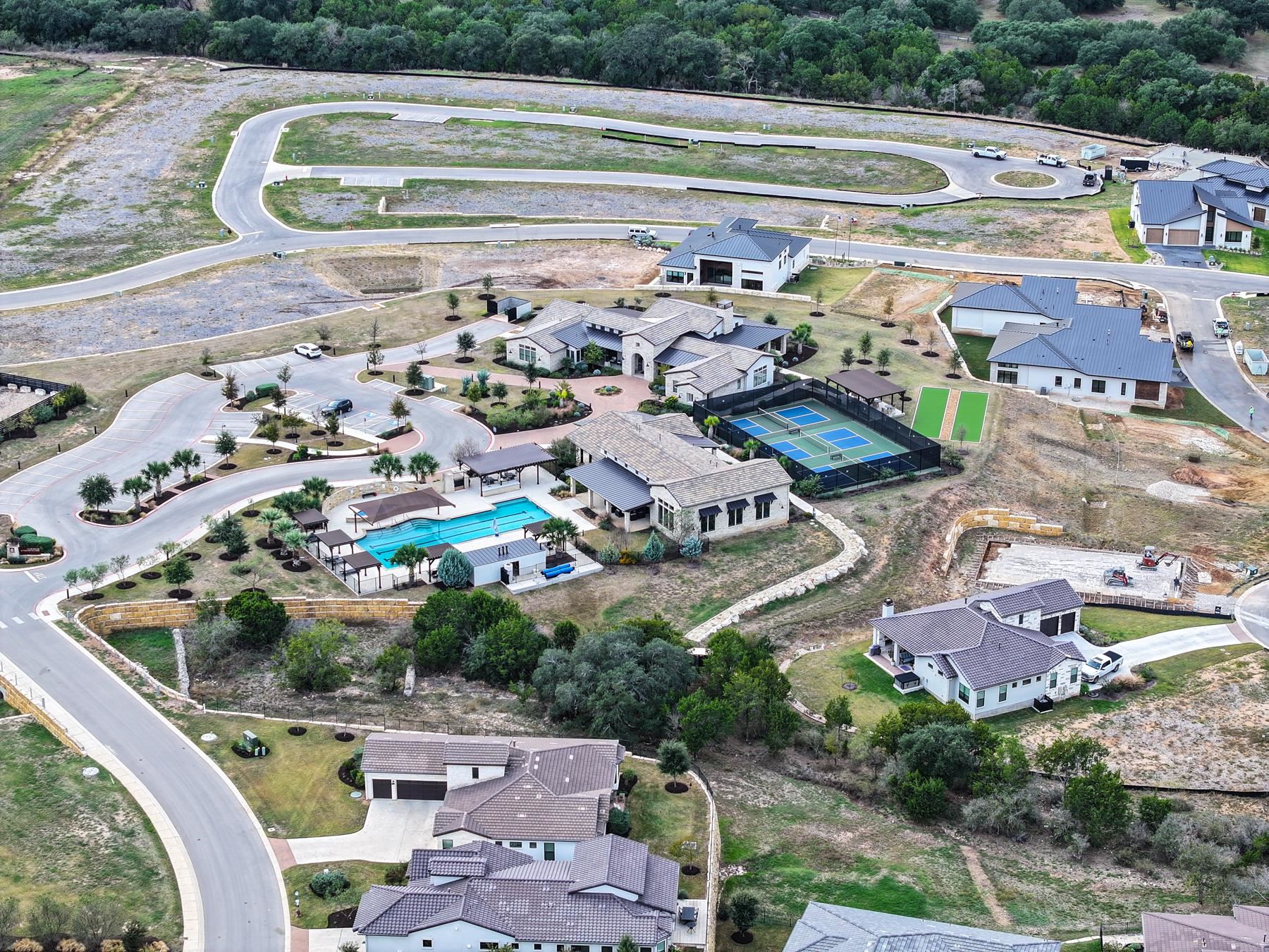 115 Rivalto Drive Horseshoe Bay, TX 78657 - Photo 23 of 29 a view of swimming pool with a yard and seating area