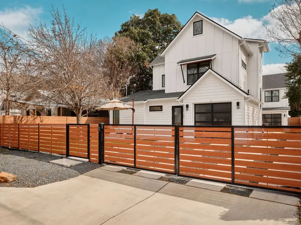 a front view of a house with a garage