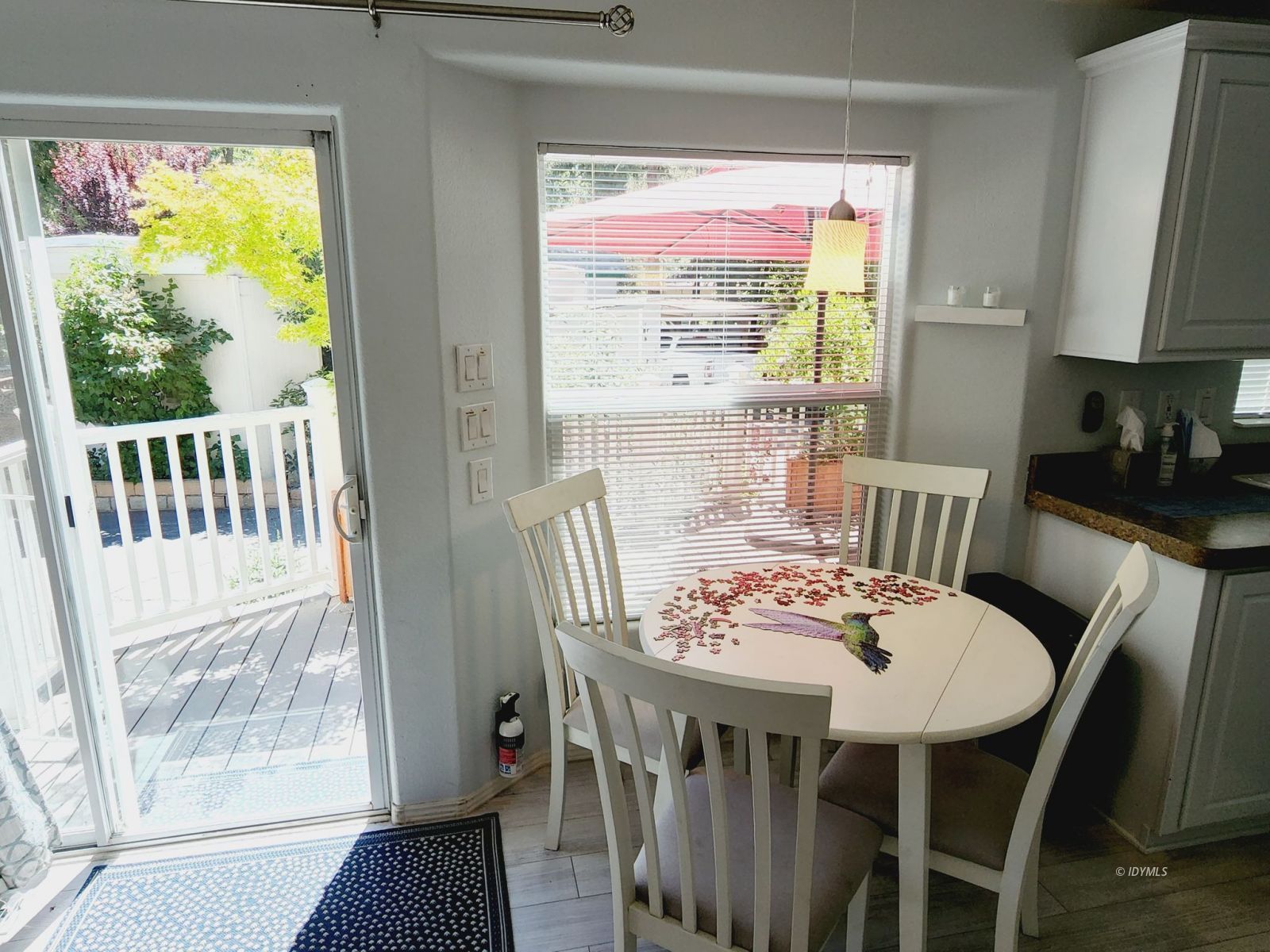 25955 Highway 243, Unit 45 Idyllwild, CA 92549 - Photo 14 of 25 a view of a dining room with furniture window and wooden floor