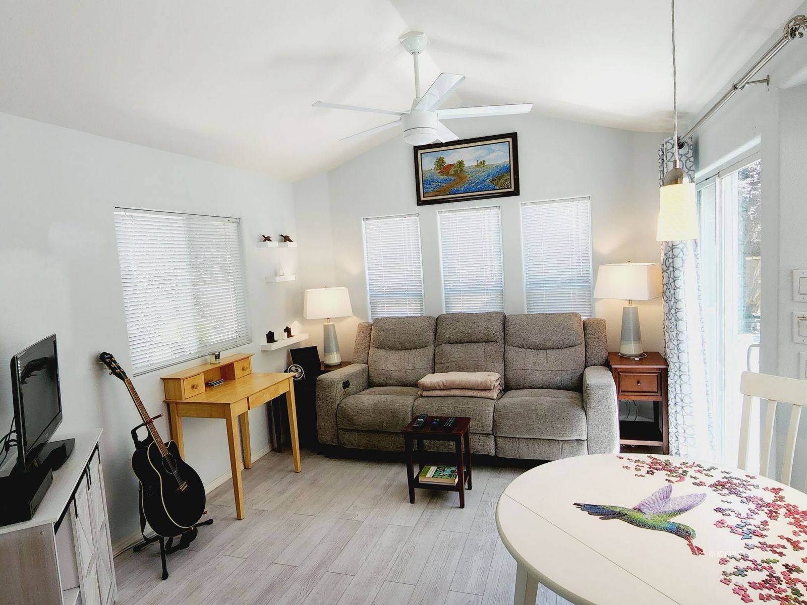 25955 Highway 243, Unit 45 Idyllwild, CA 92549 - Photo 20 of 25 a living room with furniture and a flat screen tv