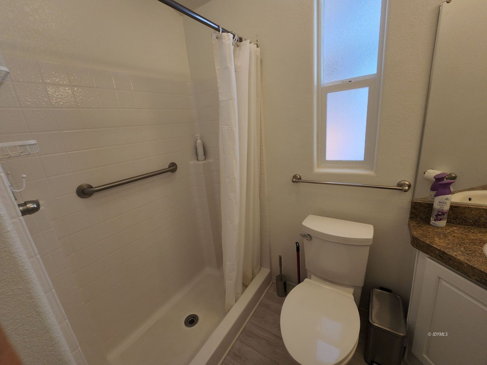 25955 Highway 243, Unit 45 Idyllwild, CA 92549 - Photo 22 of 25 a white toilet sitting next to a bathroom sink