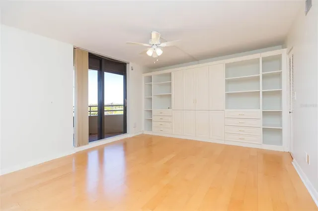 a bathroom with a shower sink and mirror