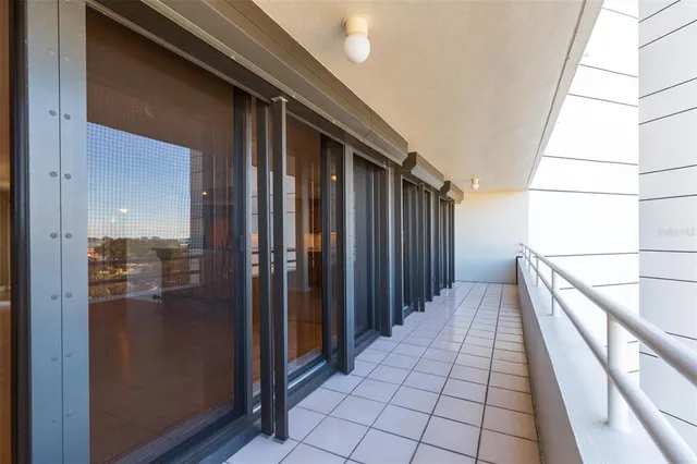 a view of swimming pool with outdoor seating