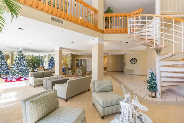 a large white building with glass windows