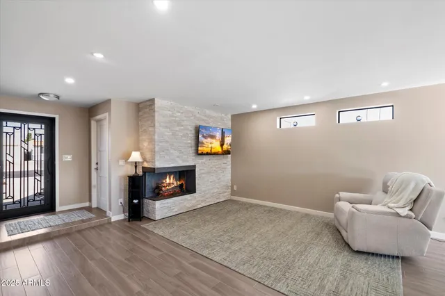 a bedroom with a bed and ceiling fan