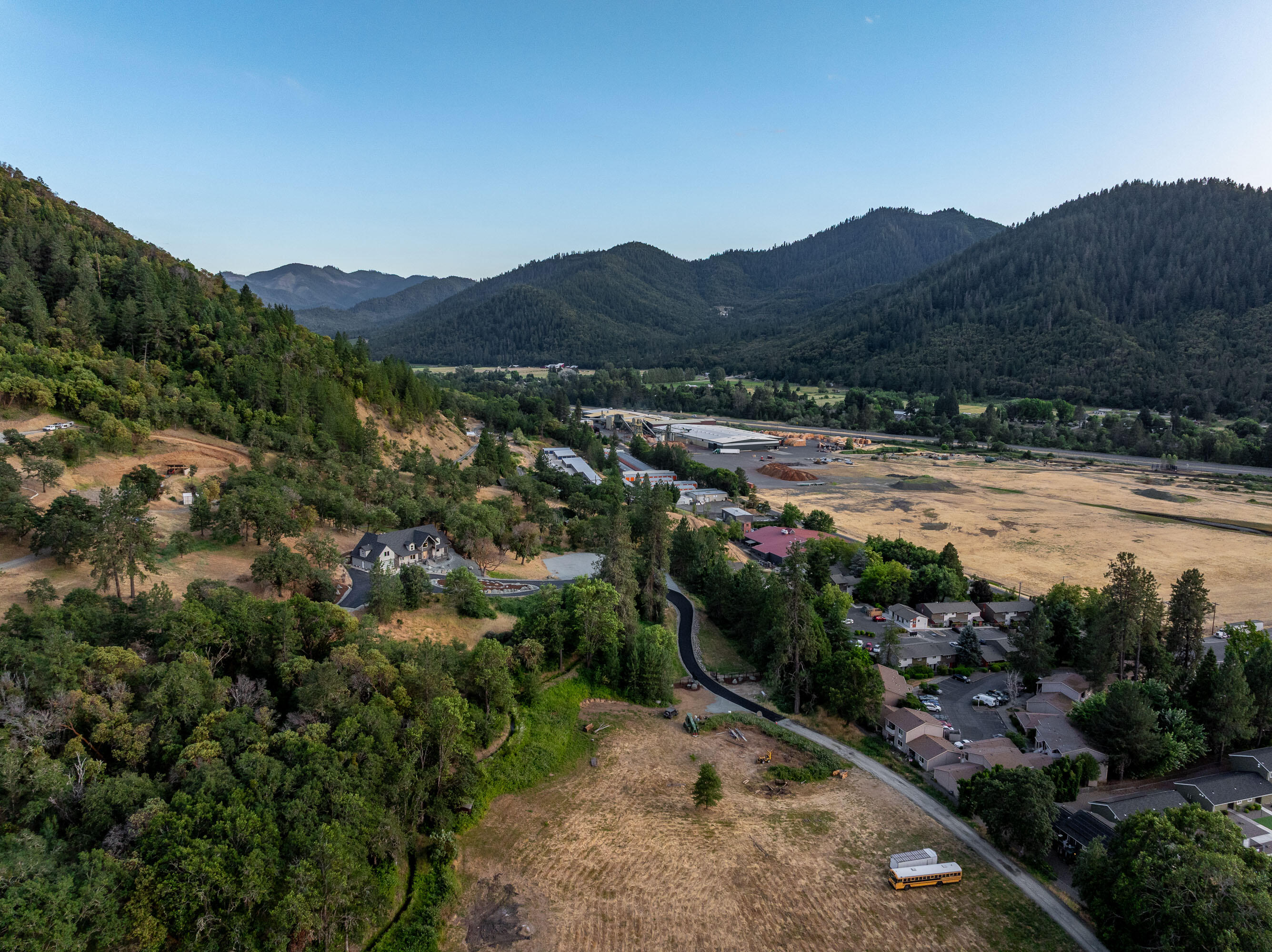 182 Wards Creek Road Rogue River, OR 97537 - Photo 76 of 80 a view of a town with mountains in the background