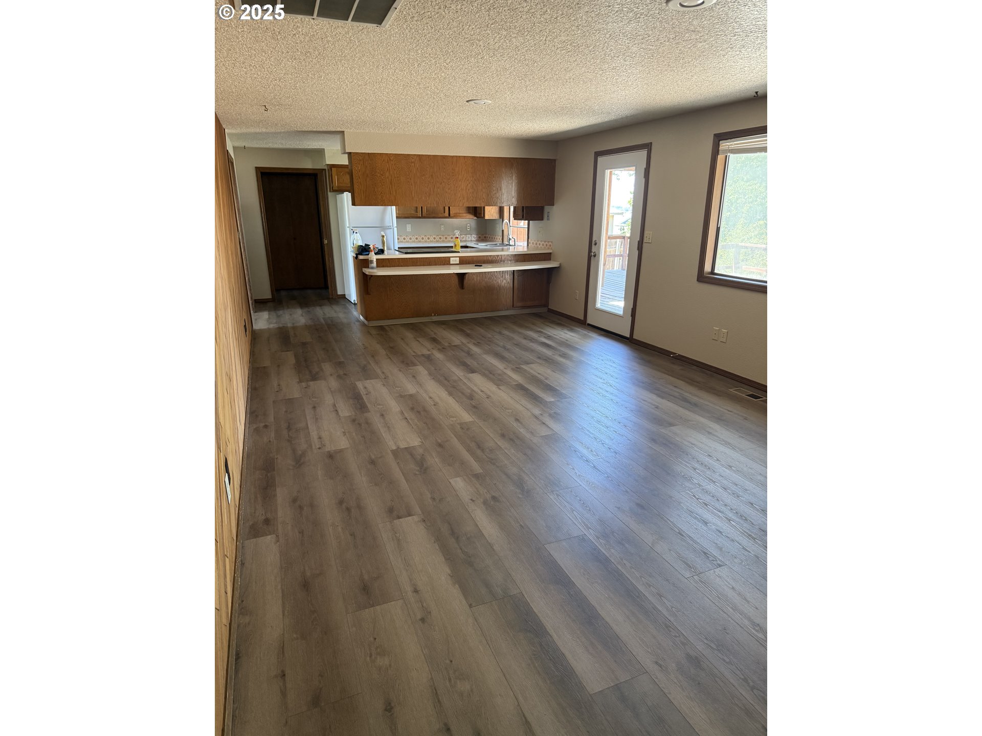 370 Monroe Street Umatilla, OR 97882 - Photo 2 of 5 a kitchen with a sink and a stove