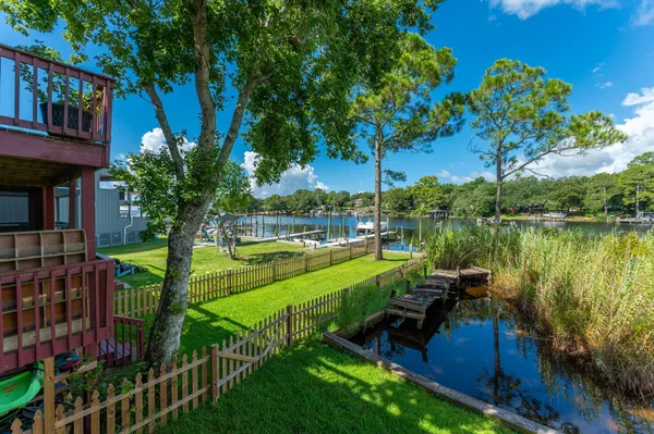 a view of a lake with a garden