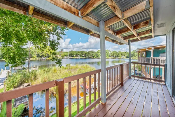 a view of a balcony with lake view