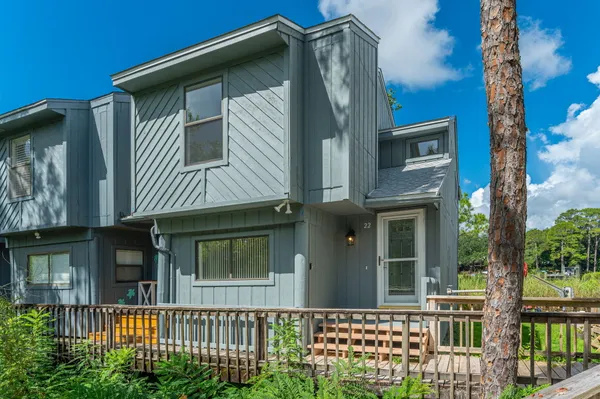 a front view of a house with a porch