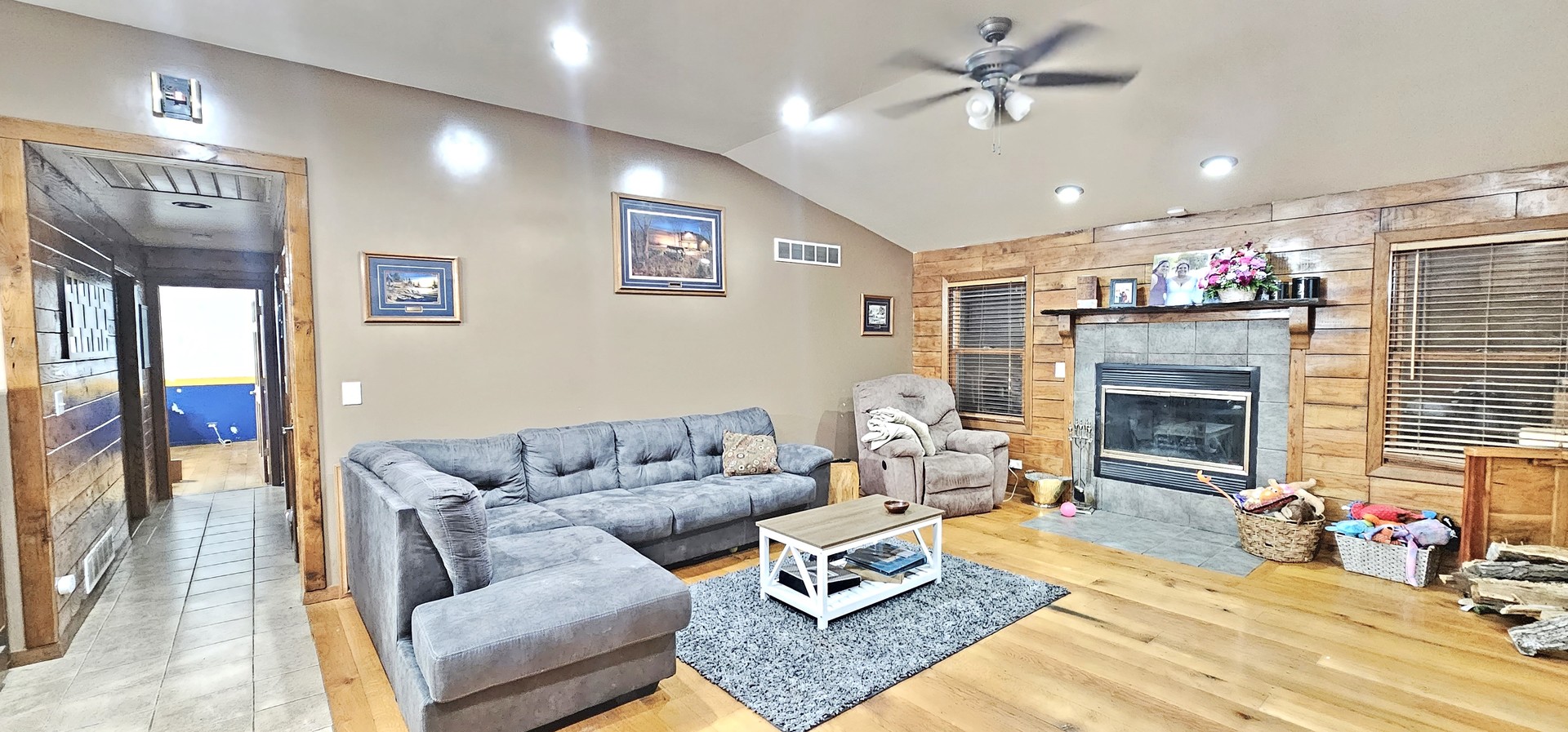22116 Southwest Frontage Road Shorewood, IL 60404 - Photo 12 of 35 a living room with furniture and a fireplace