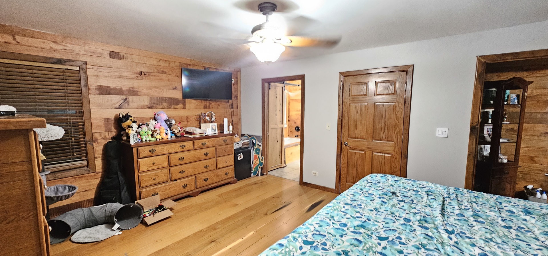 22116 Southwest Frontage Road Shorewood, IL 60404 - Photo 18 of 35 a bedroom with a bed and a dresser in it