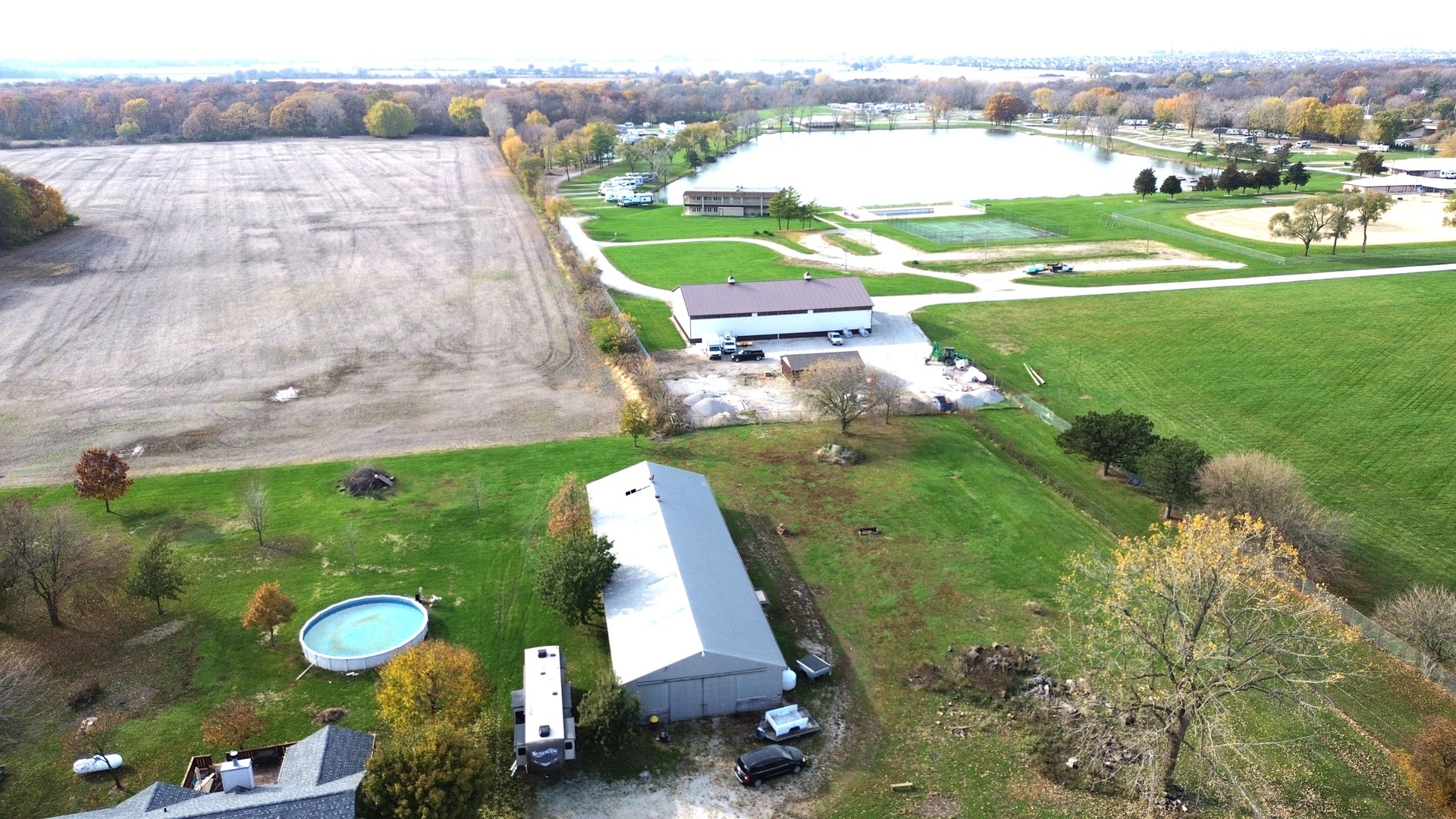 22116 Southwest Frontage Road Shorewood, IL 60404 - Photo 32 of 35 an aerial view of a house with a garden and swimming pool