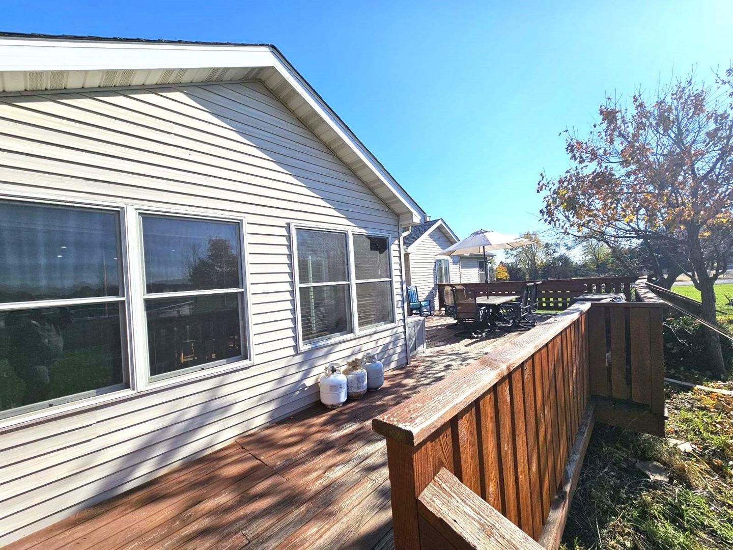 22116 Southwest Frontage Road Shorewood, IL 60404 - Photo 9 of 35 a balcony view with a large window and wooden floor